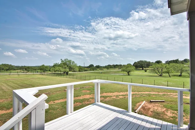 a view of a balcony with lake view