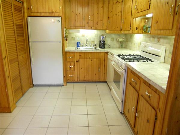 3 Elizabeth Road Billerica, MA 01821 - Photo 13 of 20 a kitchen with a sink a stove and refrigerator