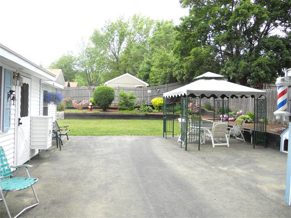 3 Elizabeth Road Billerica, MA 01821 - Photo 19 of 20 a view of a outdoor sitting area with golf course