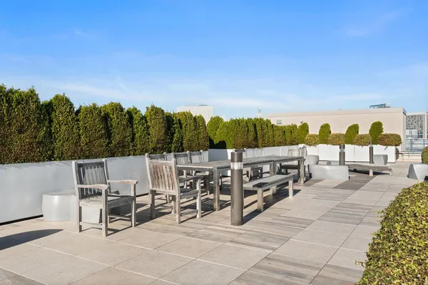 a view of a terrace with chairs
