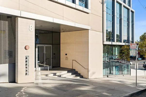 a narrow alley leading to a building