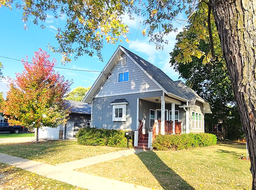 a view of a house with a swimming pool