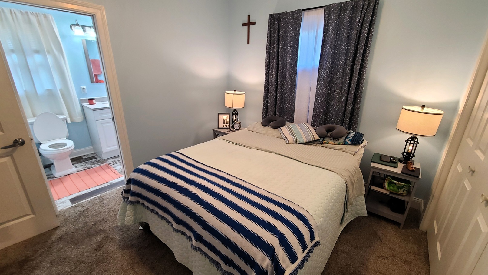 405 North Center Street Plano, IL 60545 - Photo 11 of 35 a bedroom with a bed and a mirror