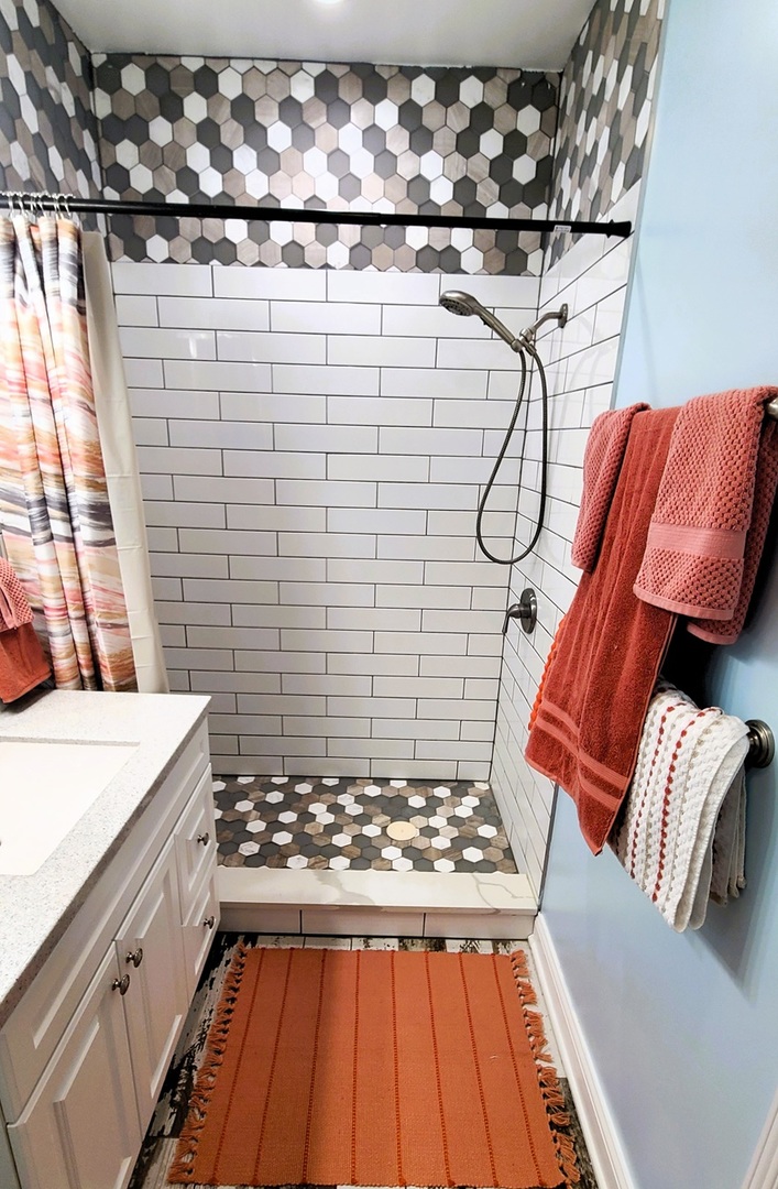405 North Center Street Plano, IL 60545 - Photo 14 of 35 a bathroom with a sink and a shower