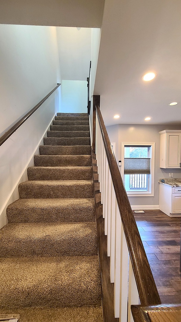 405 North Center Street Plano, IL 60545 - Photo 16 of 35 a view of entryway and hall with wooden floor