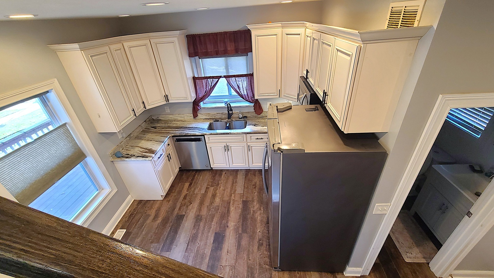 405 North Center Street Plano, IL 60545 - Photo 17 of 35 a view of kitchen and wooden floor