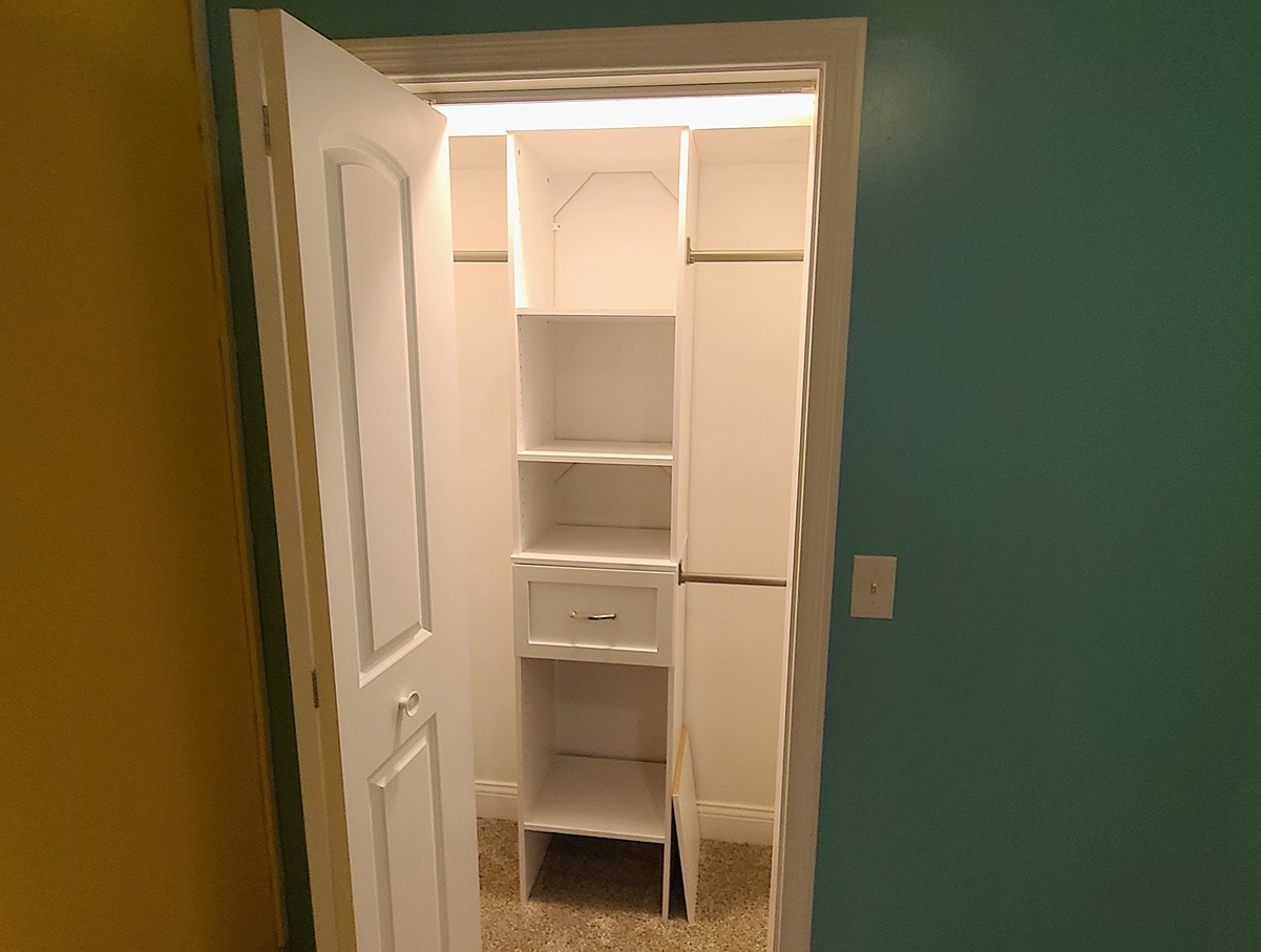 405 North Center Street Plano, IL 60545 - Photo 27 of 35 a view of walk in closet with empty racks