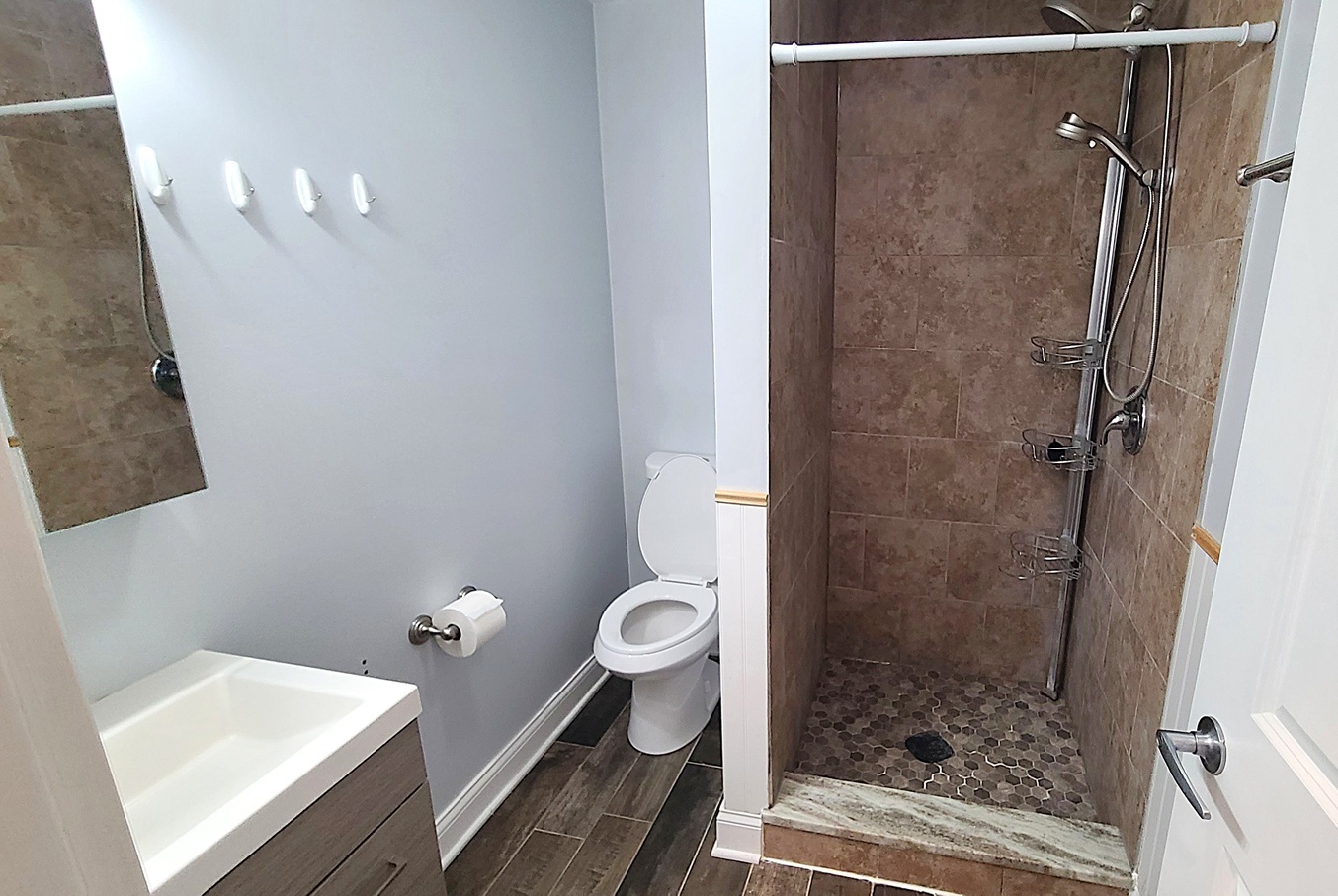 405 North Center Street Plano, IL 60545 - Photo 28 of 35 a bathroom with a sink and toilet