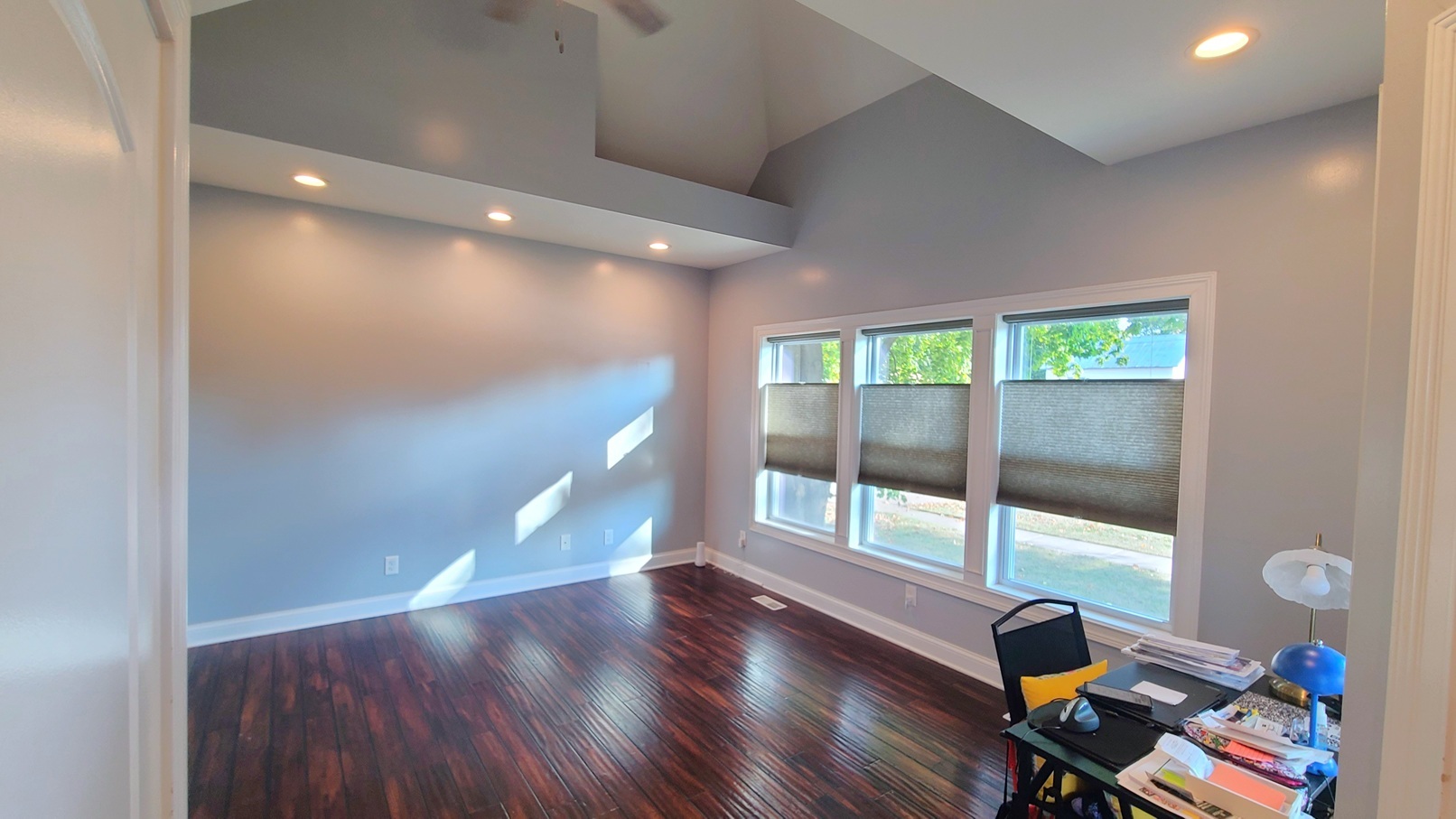 405 North Center Street Plano, IL 60545 - Photo 5 of 35 a view of a workspace with wooden floor and windows