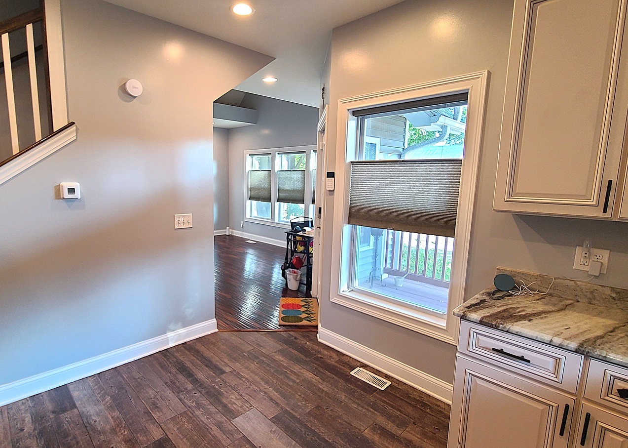 405 North Center Street Plano, IL 60545 - Photo 7 of 35 workspace with wooden floor and windows