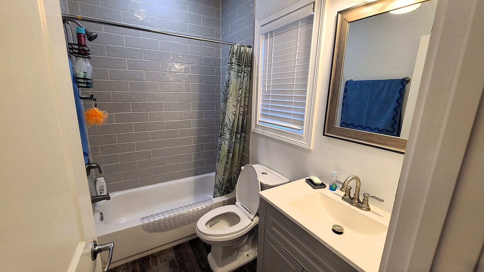 405 North Center Street Plano, IL 60545 - Photo 10 of 35 a bathroom with a sink a toilet and shower