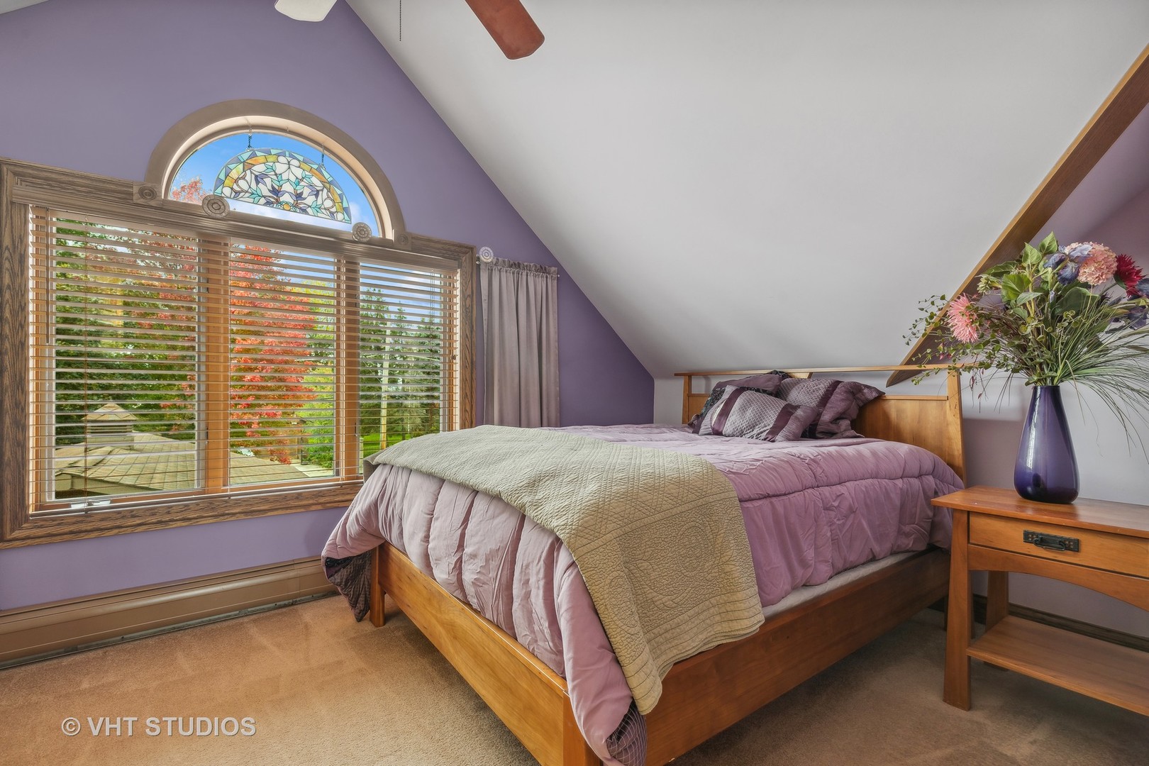 37131 North Stanton Point Road Ingleside, IL 60041 - Photo 16 of 28 a bed sitting in a bedroom next to a window