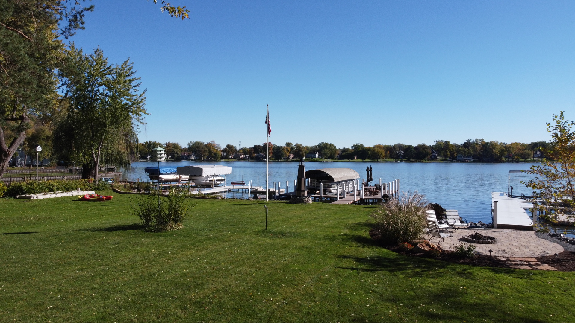 37131 North Stanton Point Road Ingleside, IL 60041 - Photo 27 of 28 a view of a lake with houses