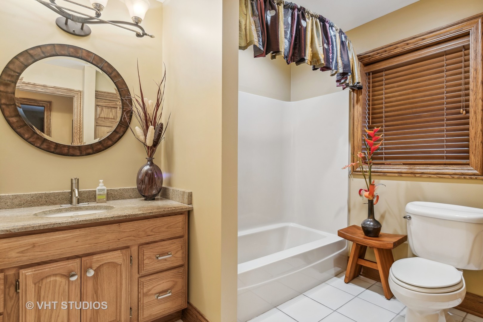 37131 North Stanton Point Road Ingleside, IL 60041 - Photo 9 of 28 a bathroom with a granite countertop sink toilet and a mirror
