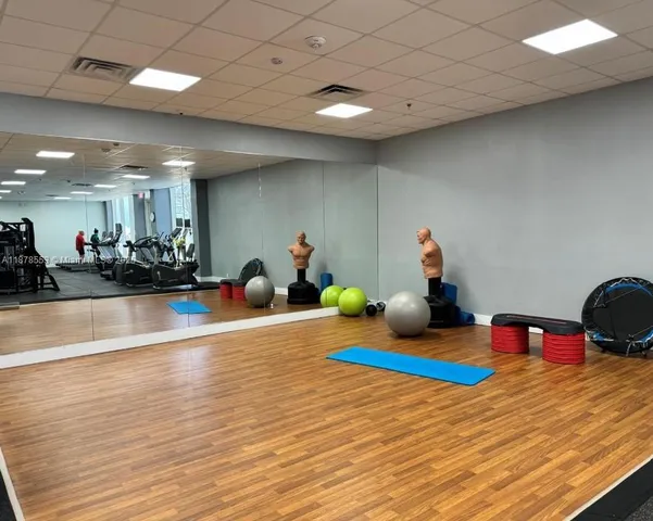 a view of a room with gym equipment