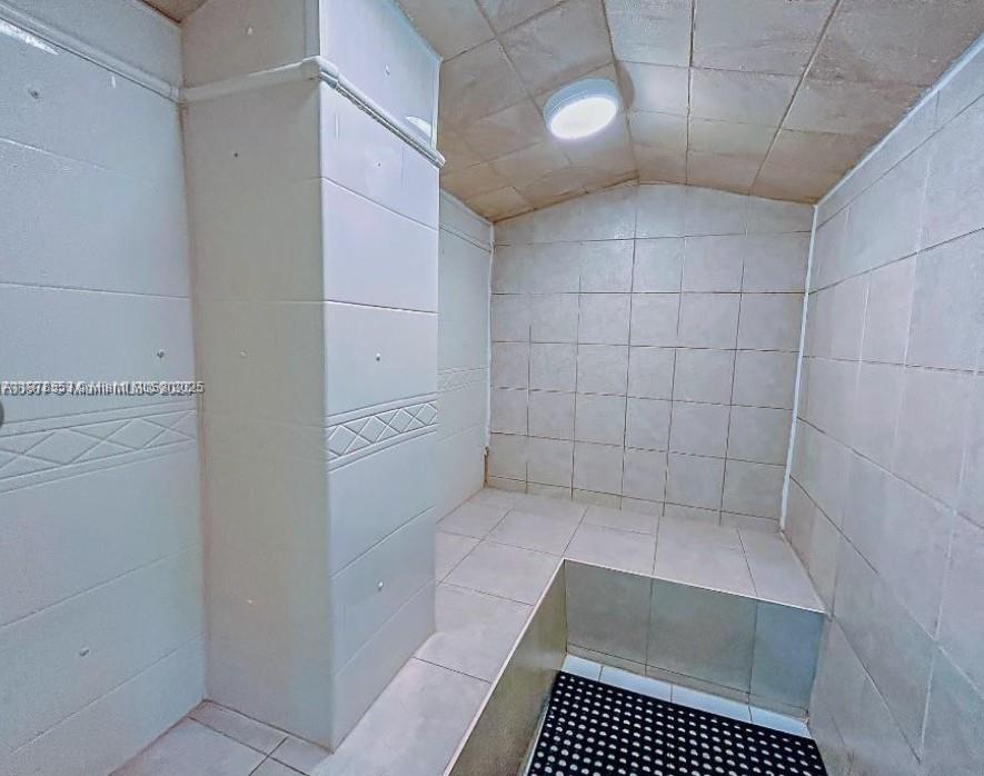 2030 South Ocean Drive, Unit 725 Hallandale Beach, FL 33009 - Photo 18 of 21 a bathroom with a shower