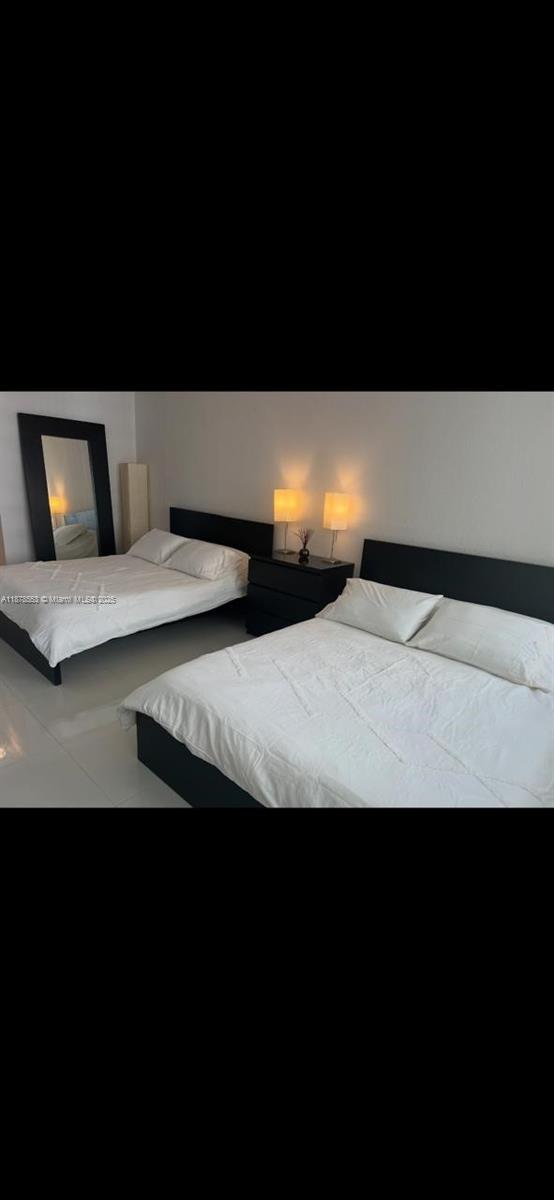 2030 South Ocean Drive, Unit 725 Hallandale Beach, FL 33009 - Photo 8 of 21 a view of wooden floor and a potted plant