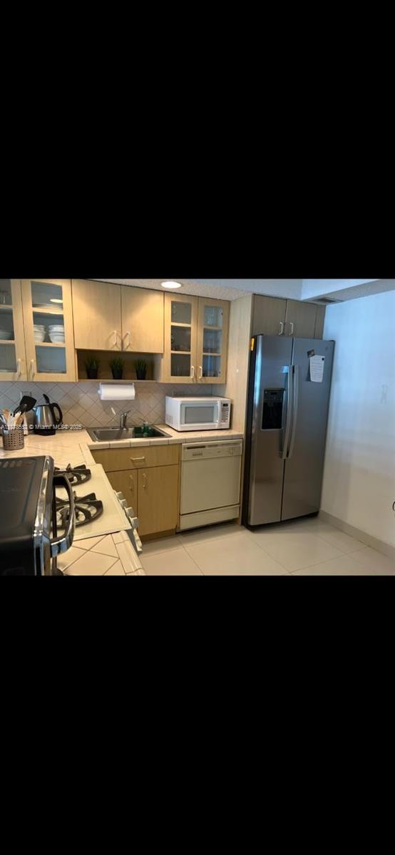 2030 South Ocean Drive, Unit 725 Hallandale Beach, FL 33009 - Photo 10 of 21 a view of kitchen living room with furniture