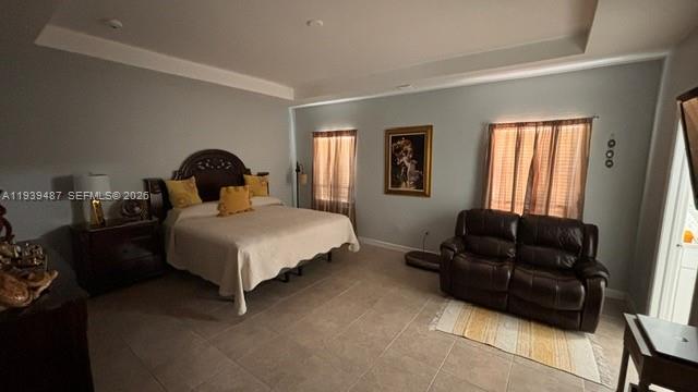 11382 Southwest 242nd Street Homestead, FL 33032 - Photo 11 of 21 a bed room with a bed and a couch