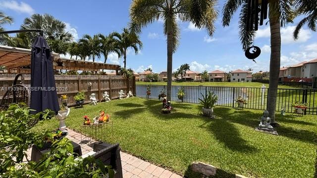 11382 Southwest 242nd Street Homestead, FL 33032 - Photo 18 of 21 a view of a garden with sitting area