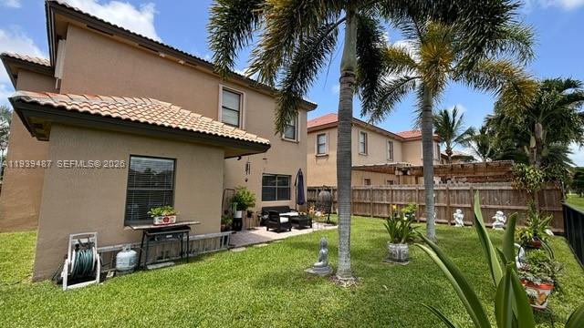 11382 Southwest 242nd Street Homestead, FL 33032 - Photo 20 of 21 a house view with a garden space