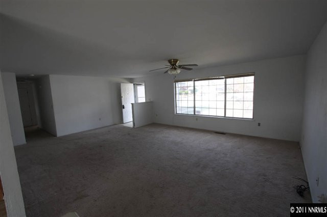 261 River Boat Road Dayton, NV 89403 - Photo 2 of 13 a view of empty room with windows