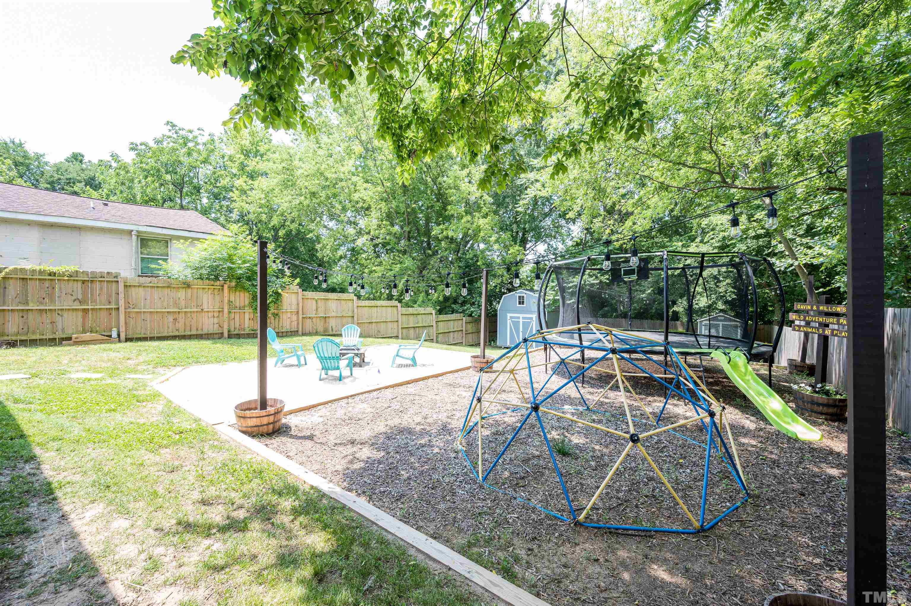 704 Quarry Street Raleigh, NC 27601 - Photo 6 of 27 a view of a backyard with swimming pool