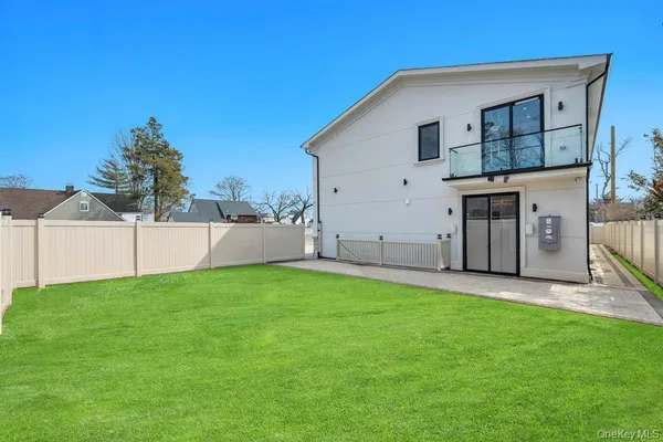 a view of a backyard of the house