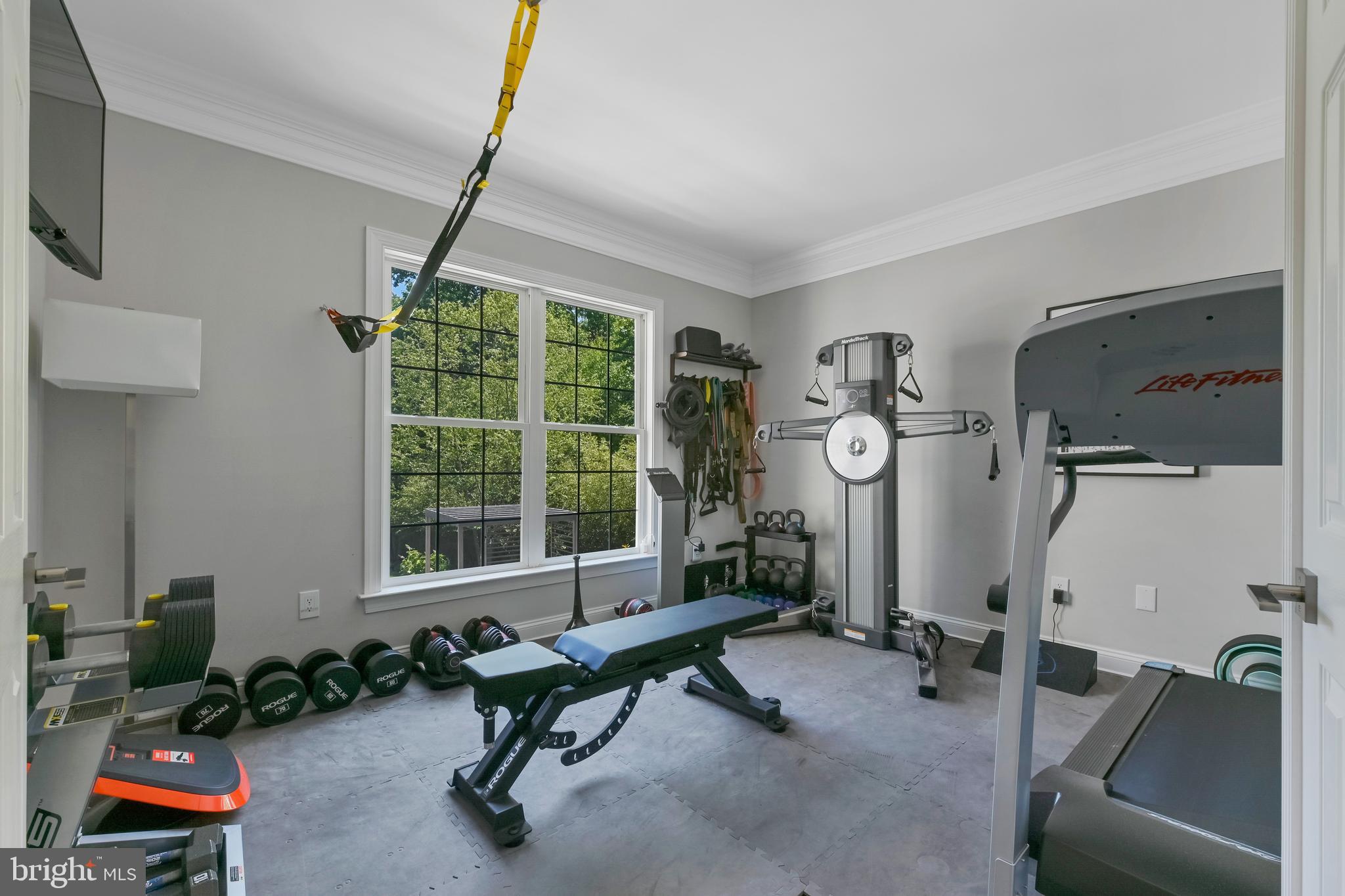 1613 Braid Hills Drive Pasadena, MD 21122 - Photo 144 of 148 a living room with furniture and a flat screen tv