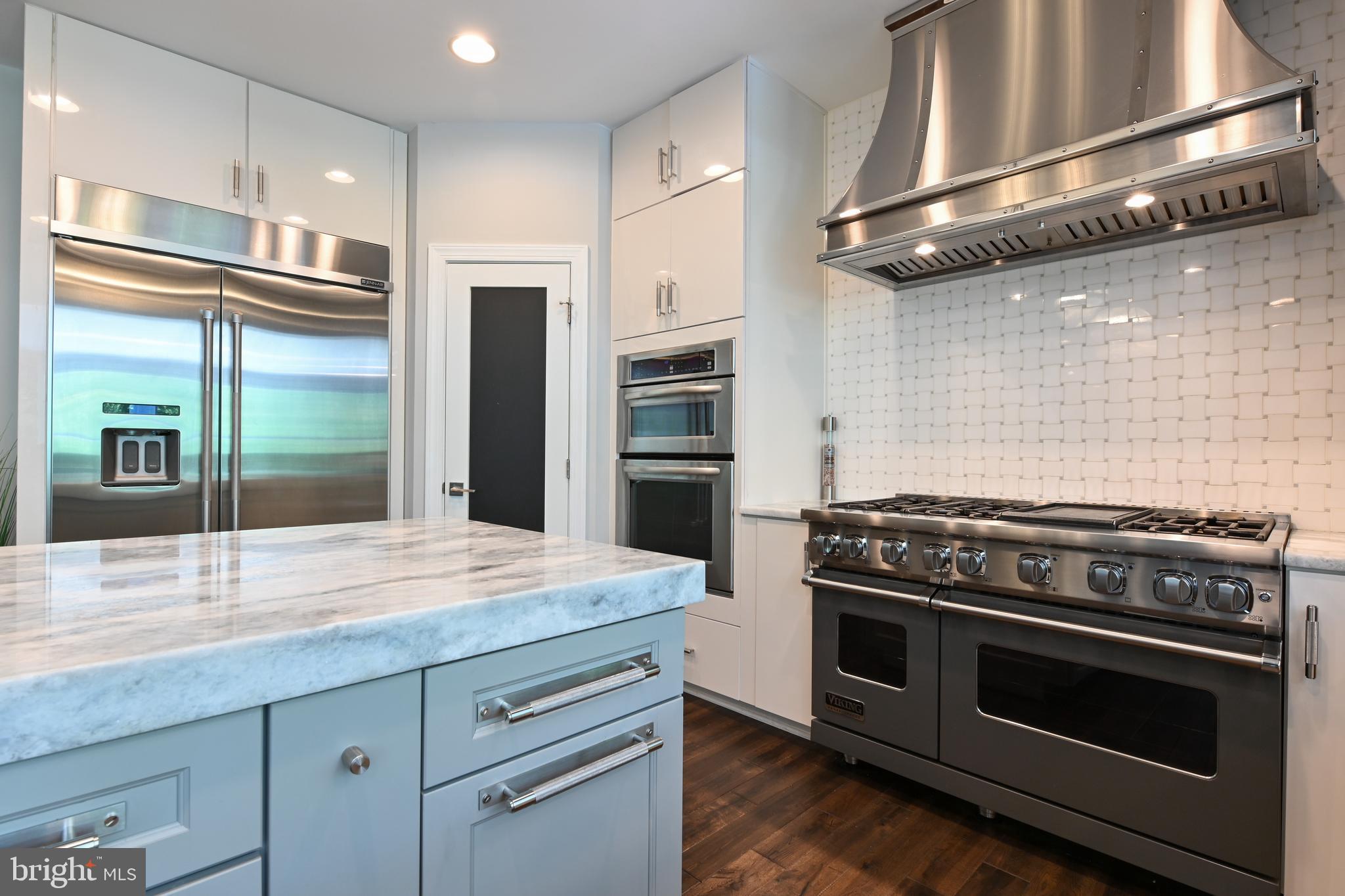 1613 Braid Hills Drive Pasadena, MD 21122 - Photo 21 of 148 a kitchen with granite countertop a stove and a refrigerator