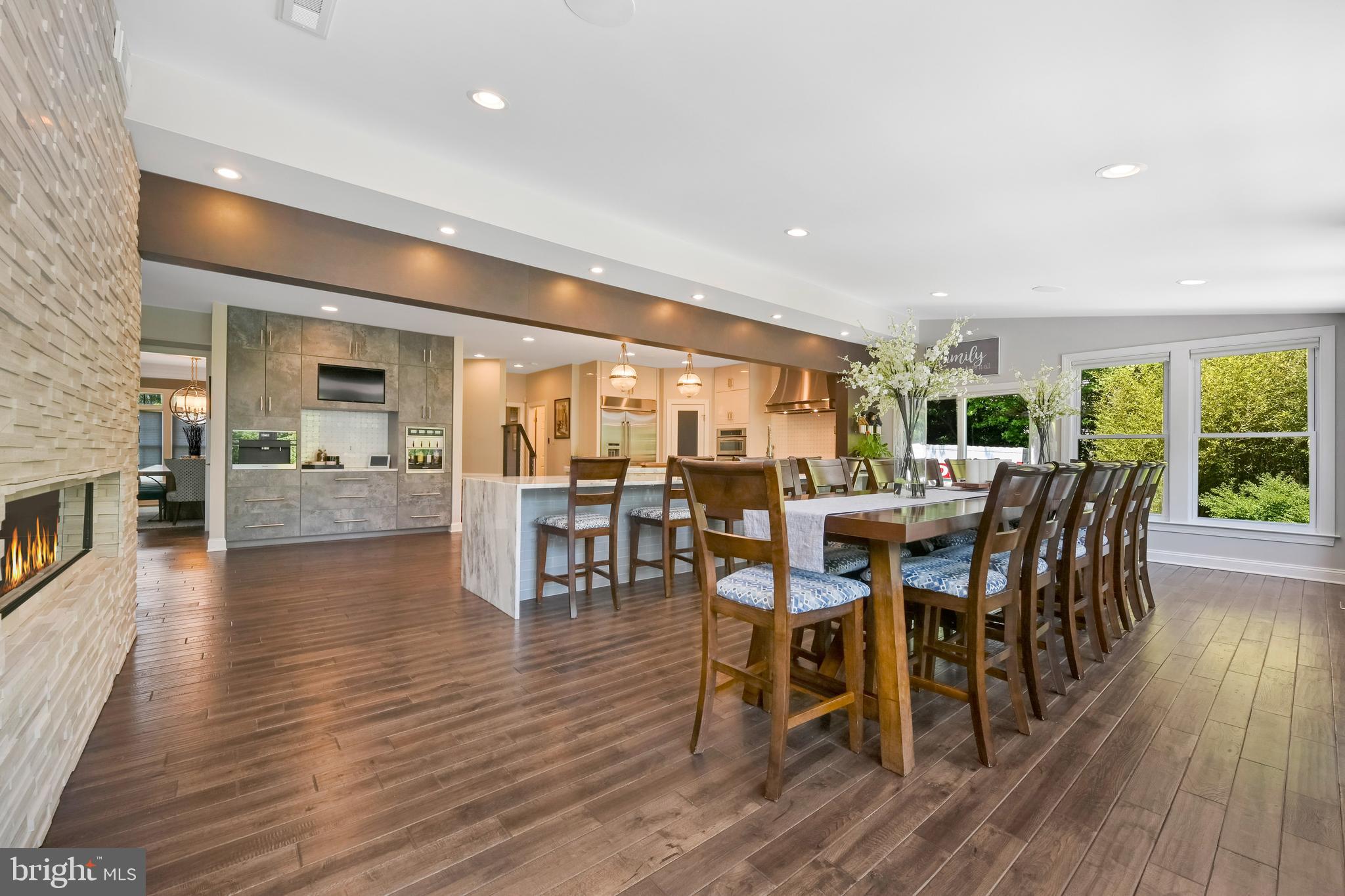 1613 Braid Hills Drive Pasadena, MD 21122 - Photo 23 of 148 a view of a dining room with furniture and wooden floor