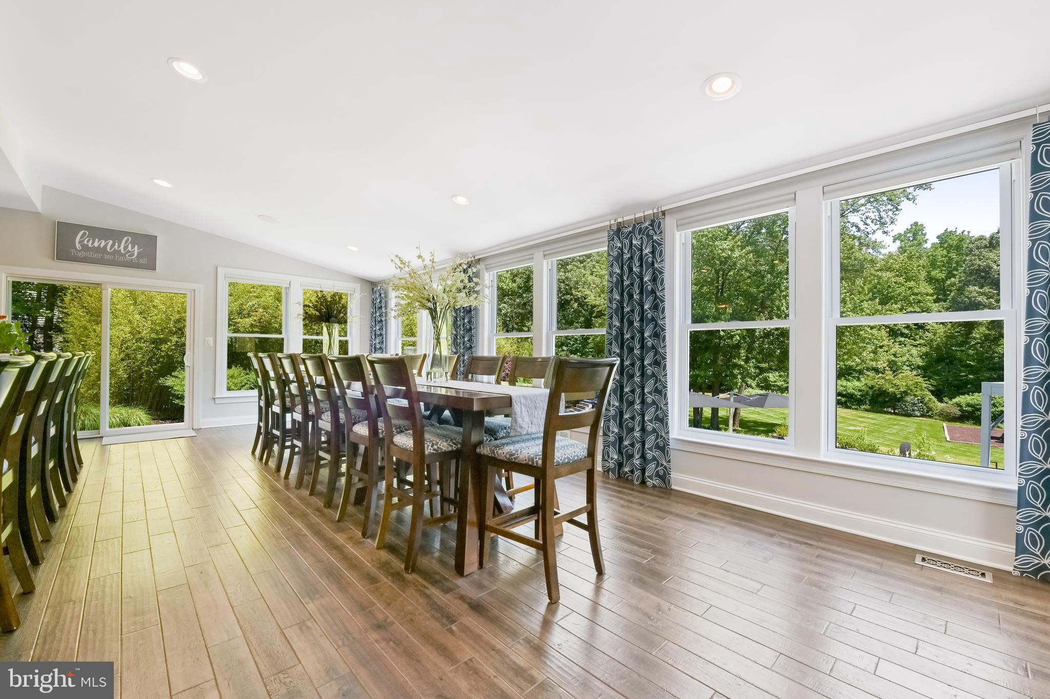 1613 Braid Hills Drive Pasadena, MD 21122 - Photo 24 of 148 a view of a dining room with furniture window and wooden floor