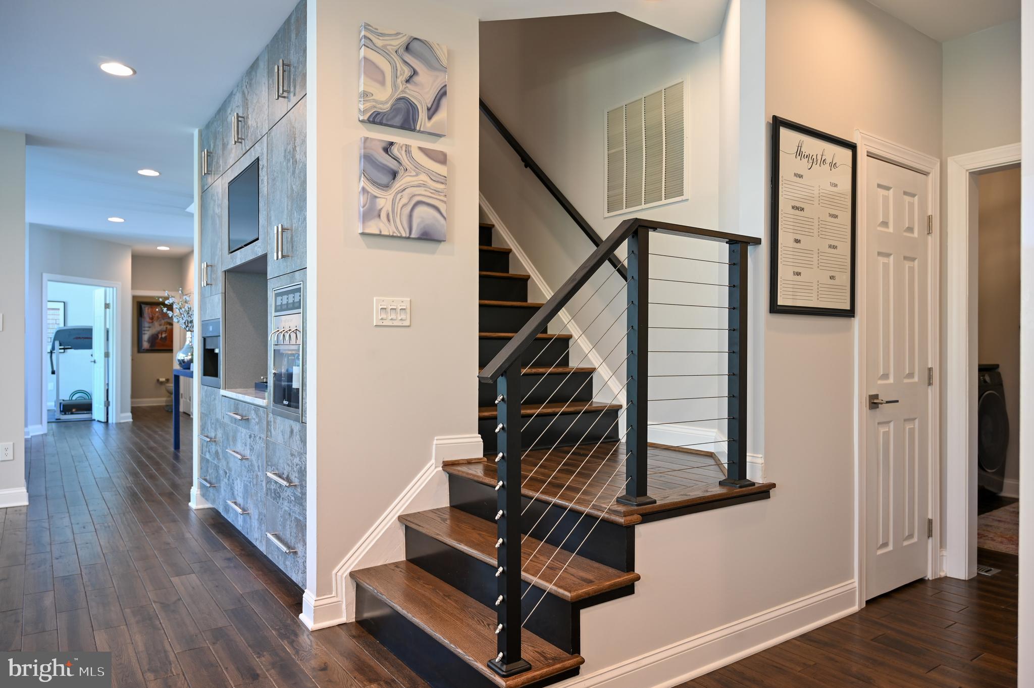1613 Braid Hills Drive Pasadena, MD 21122 - Photo 28 of 148 a view of entryway with wooden floor and stairs