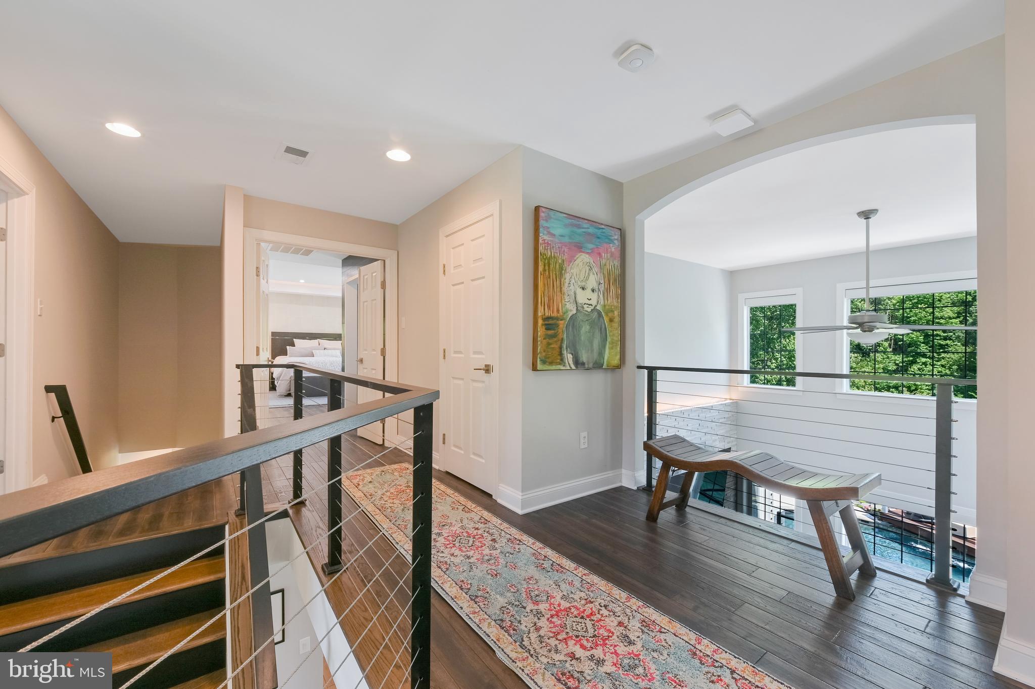 1613 Braid Hills Drive Pasadena, MD 21122 - Photo 50 of 148 a view of a livingroom with furniture a table and wooden floor