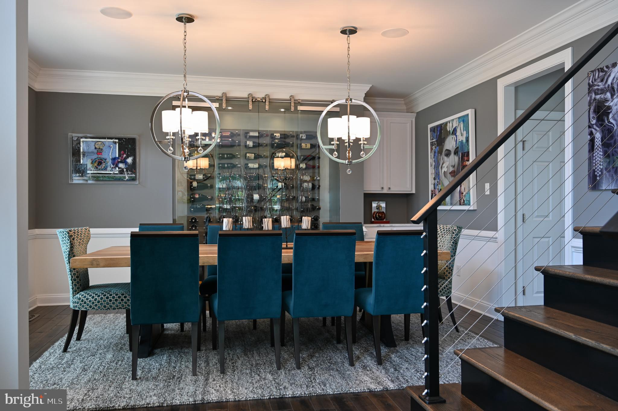 1613 Braid Hills Drive Pasadena, MD 21122 - Photo 6 of 148 a view of a dining room with furniture a chandelier and wooden floor