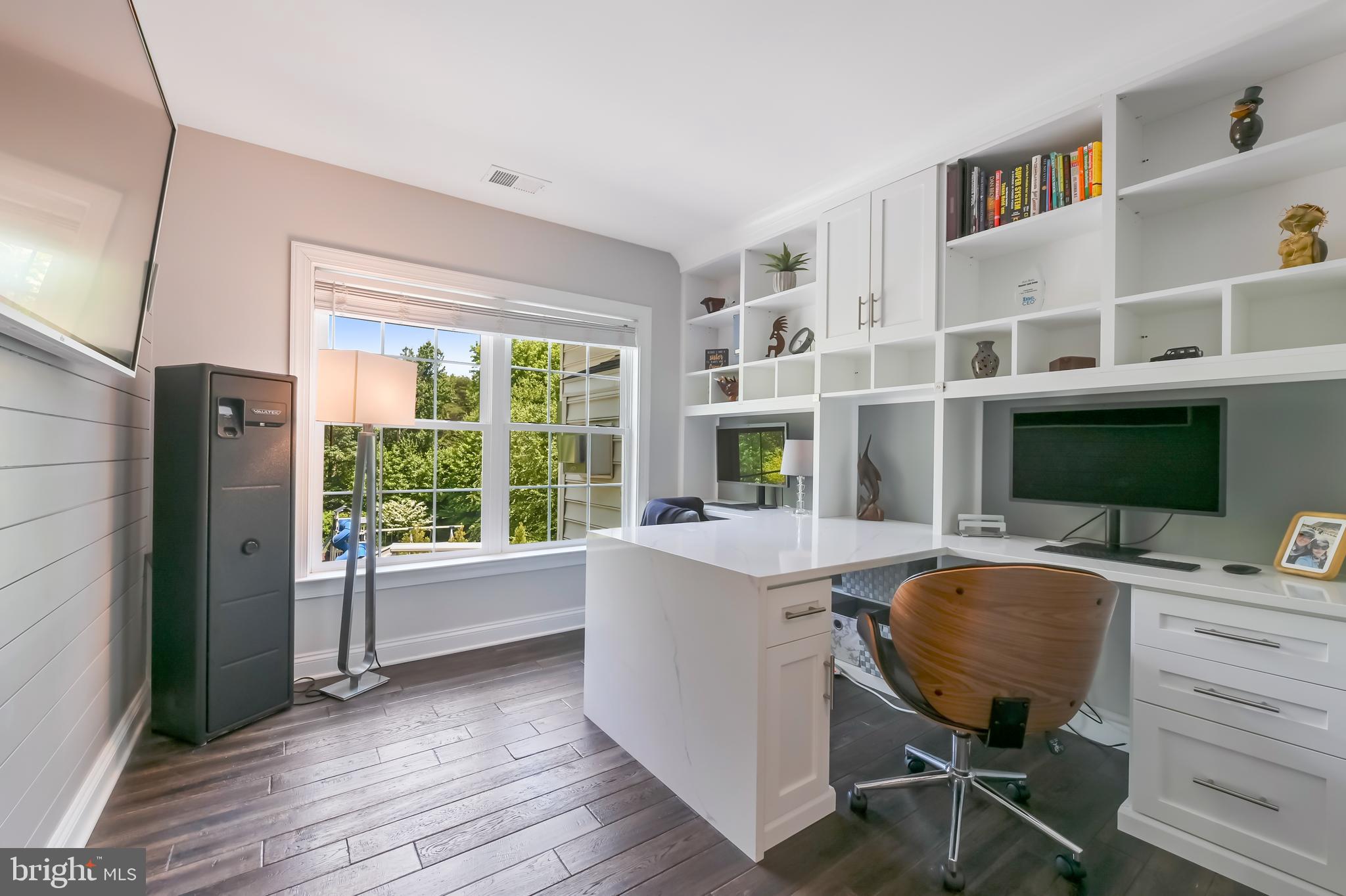 1613 Braid Hills Drive Pasadena, MD 21122 - Photo 66 of 148 a view of a workspace with furniture and a window