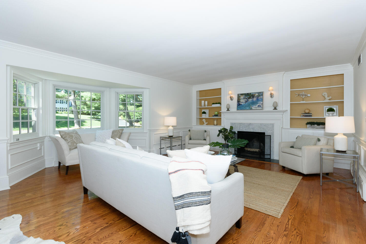 9 Old Parish Road Darien, CT 06820 - Photo 11 of 49 a living room with furniture large window and a fireplace