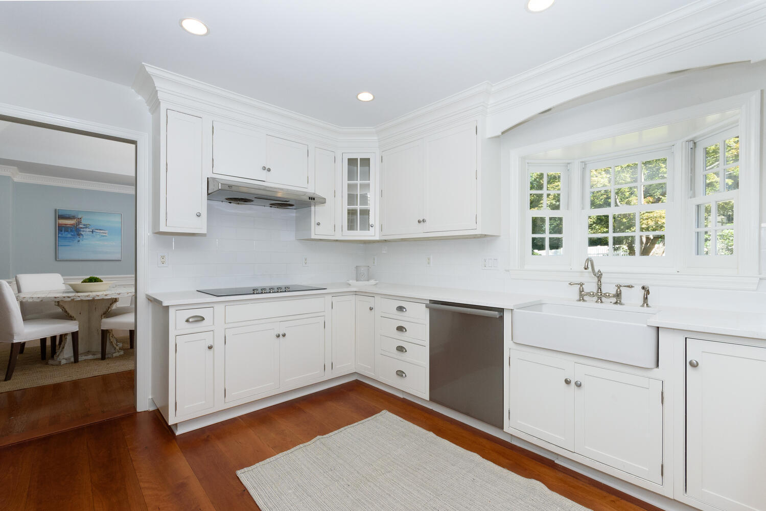 9 Old Parish Road Darien, CT 06820 - Photo 17 of 49 a kitchen with a sink stove and cabinets