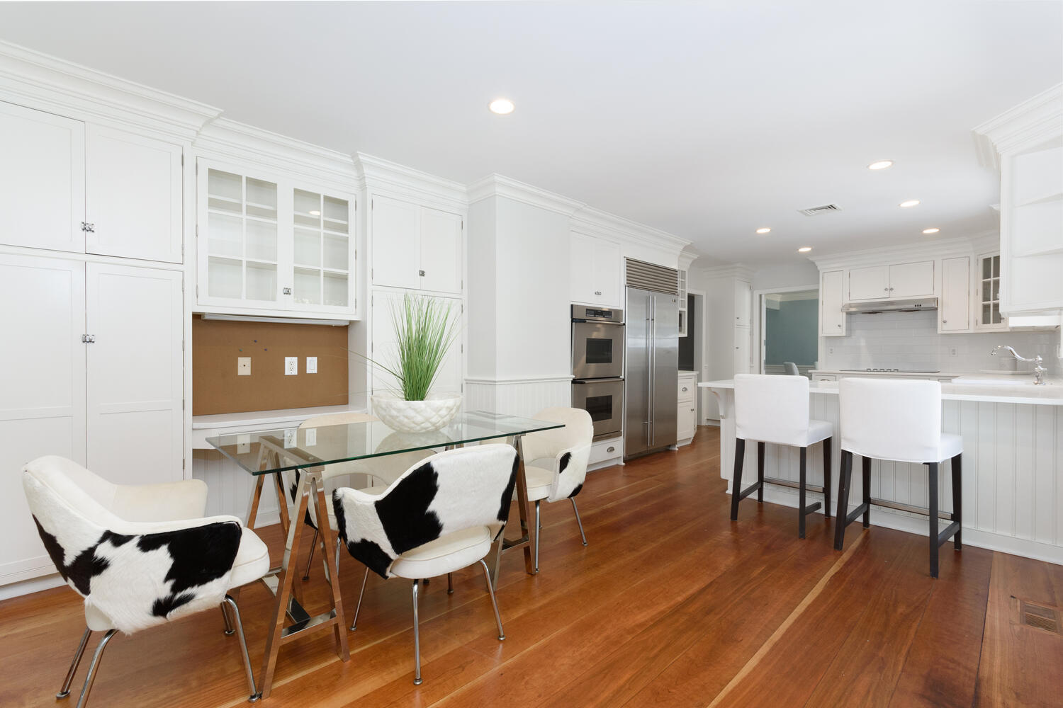 9 Old Parish Road Darien, CT 06820 - Photo 19 of 49 a living room with stainless steel appliances kitchen island granite countertop furniture and wooden floor