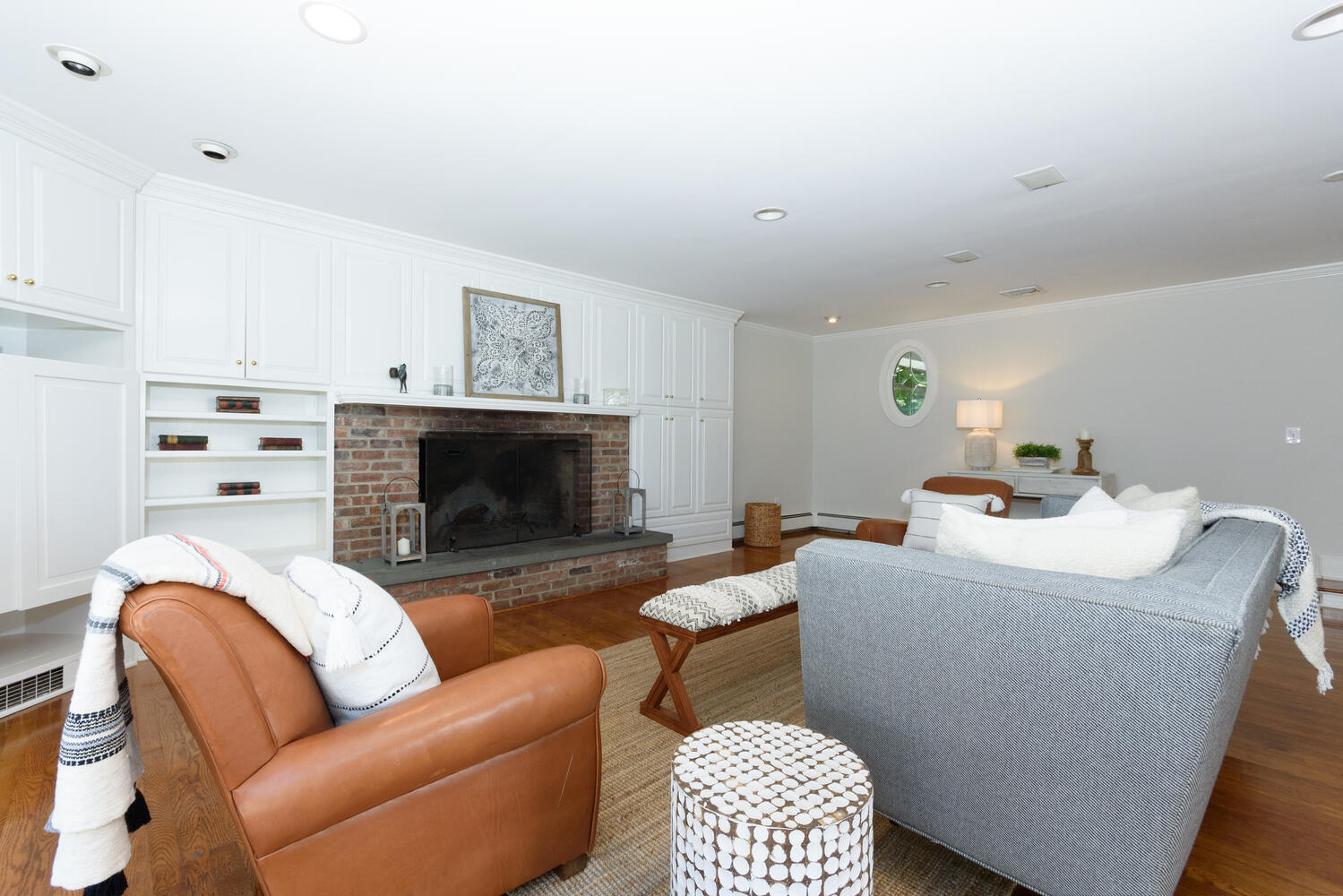 9 Old Parish Road Darien, CT 06820 - Photo 25 of 49 a living room with furniture and a fireplace