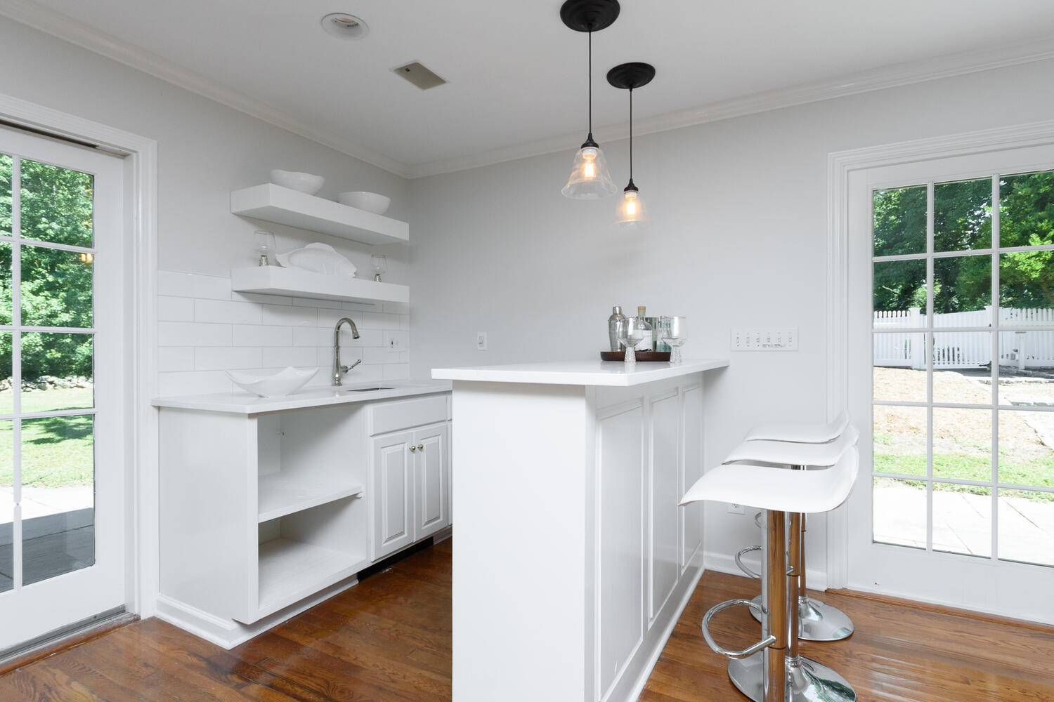 9 Old Parish Road Darien, CT 06820 - Photo 26 of 49 a kitchen with white cabinets and sink