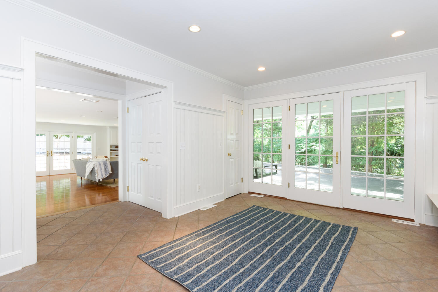 9 Old Parish Road Darien, CT 06820 - Photo 27 of 49 a view of empty room with wooden floor and fan