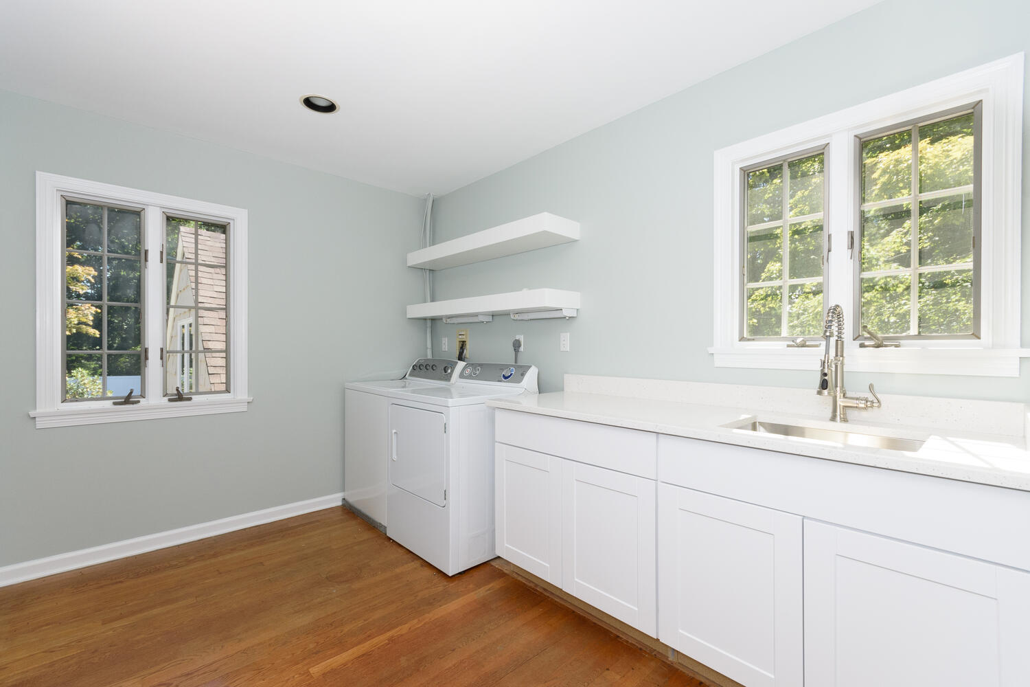 9 Old Parish Road Darien, CT 06820 - Photo 35 of 49 a room with a sink and cabinets