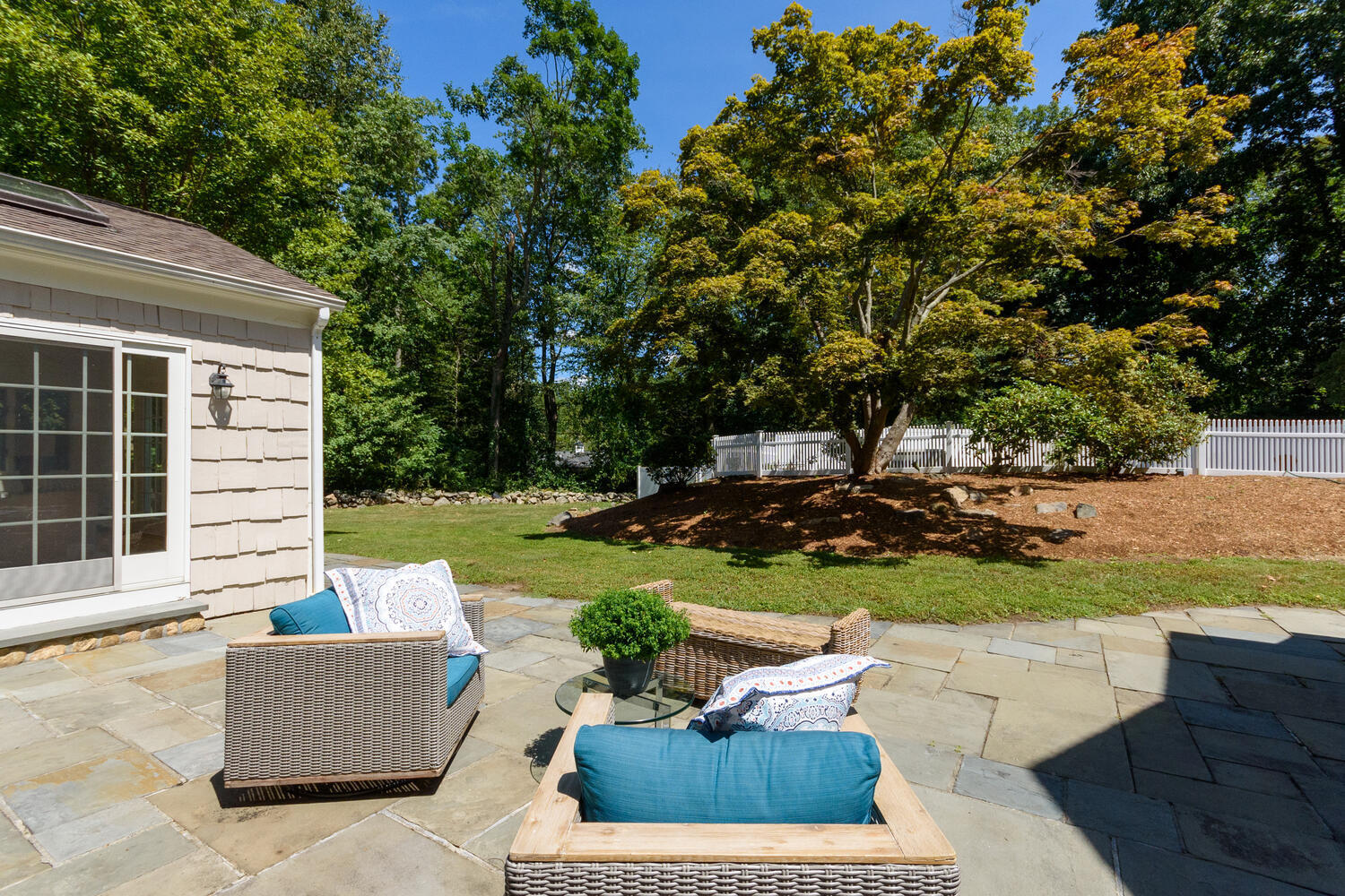 9 Old Parish Road Darien, CT 06820 - Photo 38 of 49 a view of a house with backyard sitting area and garden
