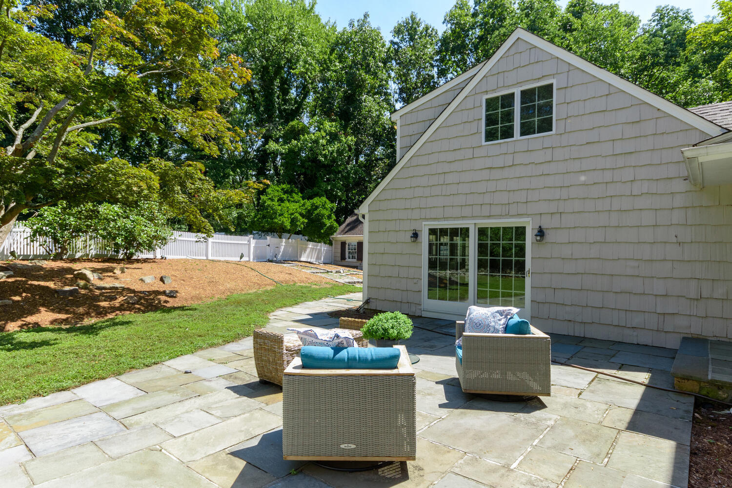 9 Old Parish Road Darien, CT 06820 - Photo 39 of 49 a view of a house with a backyard and a patio