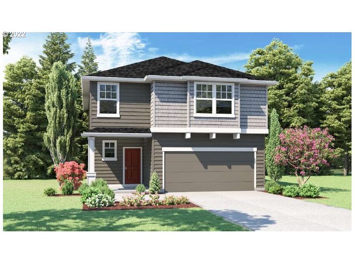 2912 Fenya Street Springfield, OR 97477 - Photo 1 of 19 a front view of a house with a garden and plants