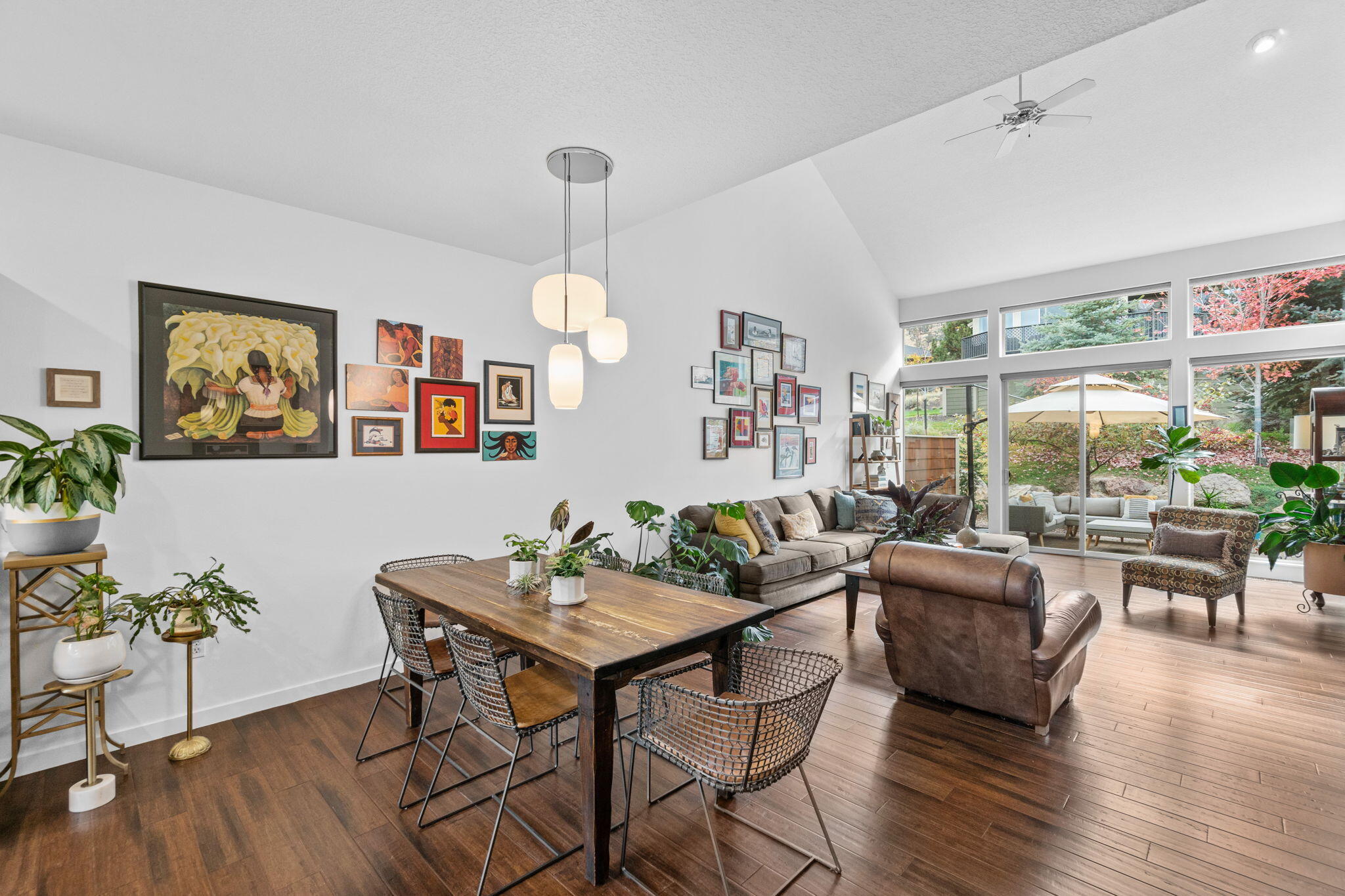 10942 Village Loop Redmond, OR 97756 - Photo 2 of 45 a living room with furniture kitchen view and a large window