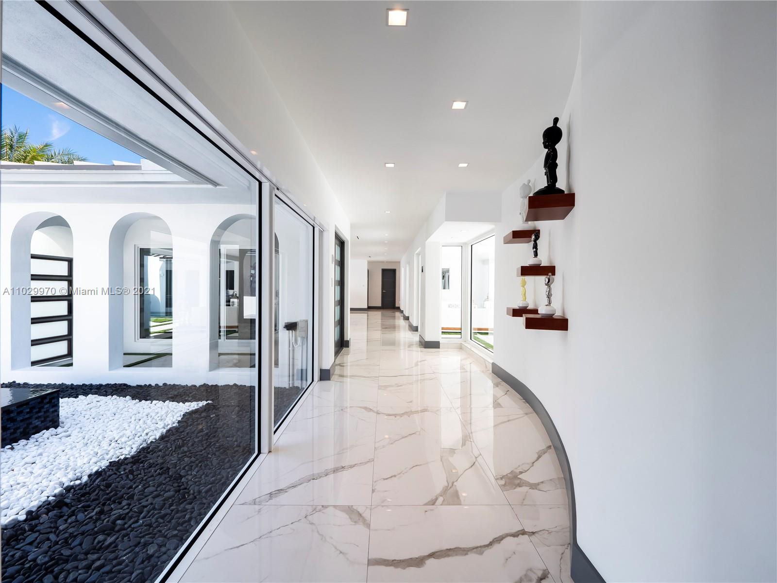 6460 Southwest 133rd Drive Pinecrest, FL 33156 - Photo 12 of 52 a view of entryway and hall