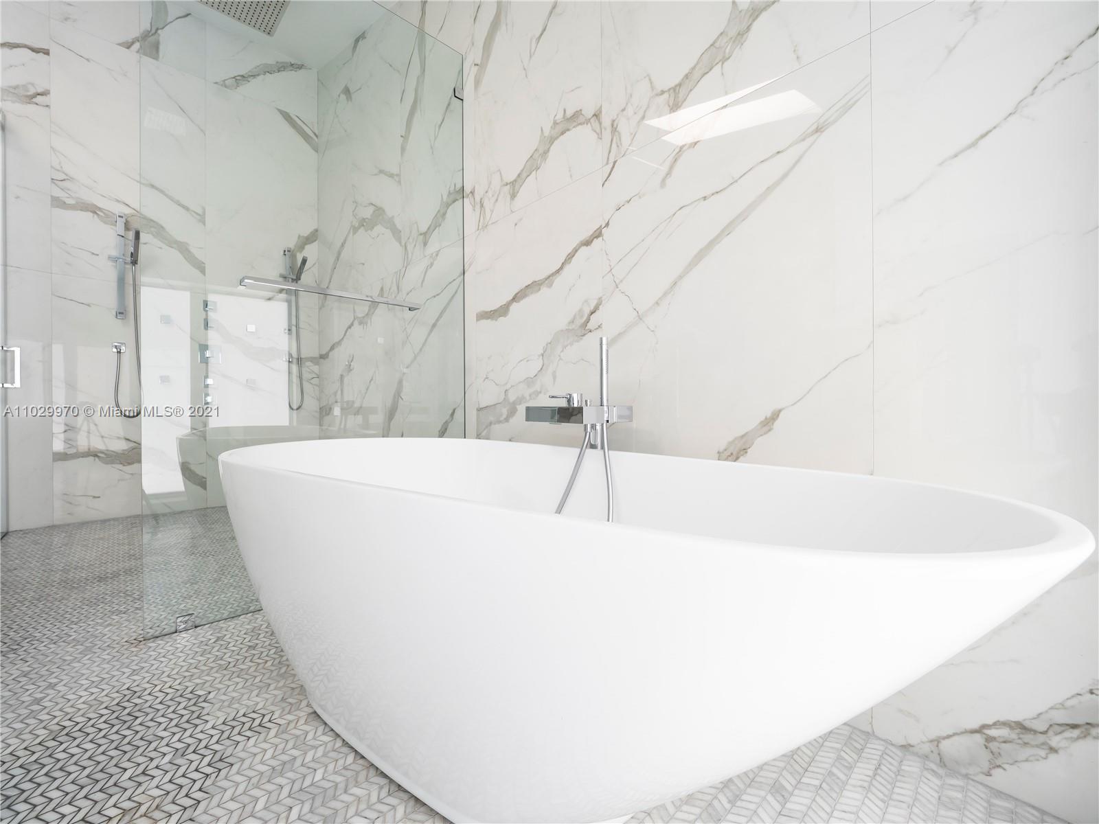 6460 Southwest 133rd Drive Pinecrest, FL 33156 - Photo 31 of 52 a view of a bathtub in a bathroom