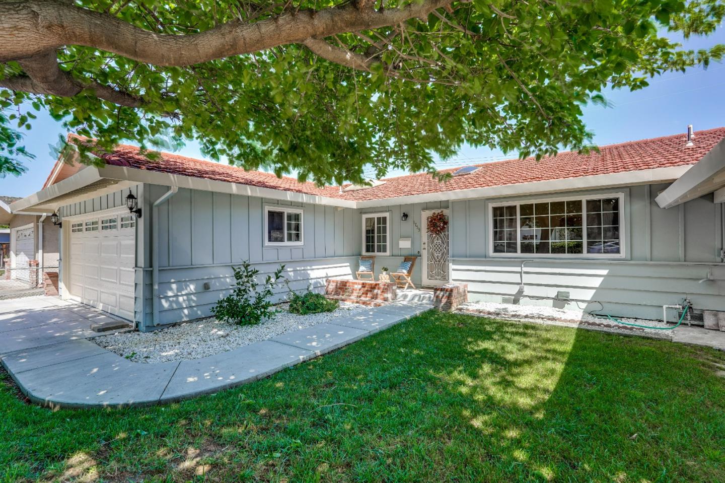 1755 Ravizza Avenue Santa Clara, CA 95051 - Photo 1 of 36 a view of a house with backyard and sitting area